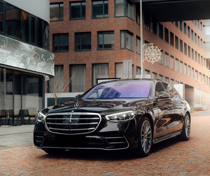 Sleek black Mercedes-Benz - Timeless sophistication in automotive excellence.